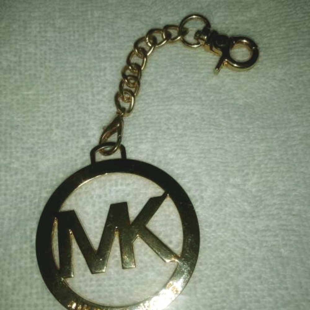 Michael Kors gold logo keychain/bag fob